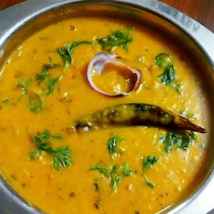 Dal tadka in a steel bowl